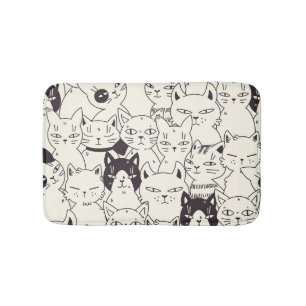 Hand-drawn cats doodle seamless pattern. bath mat