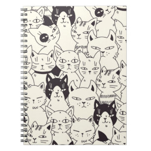 Hand-drawn cats doodle seamless pattern. notebook