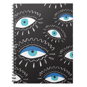 Hand drawn indian aztec tribal eye with feathers f notebook