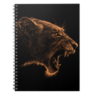 Hand drawn portrait of Lioness. Graphical sketch o Notebook