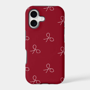 Hand drawn scissors on maroon red