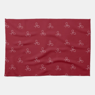 Hand drawn scissors on maroon red tea towel