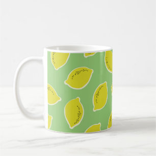 Hand drawn seamless pattern with lemons in yellow, coffee mug