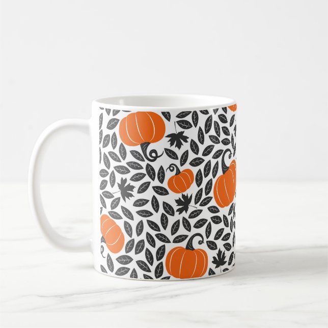 Hand drawn seamless pattern with pumpkins and leav coffee mug (Left)