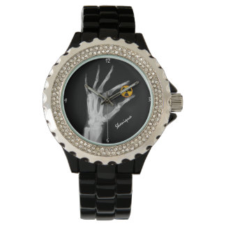 Hand Holding a Radiation Symbol Watch
