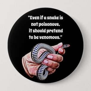 hand holding baby snake reptile quotes art 10 cm round badge