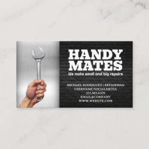 Hand Holding Wrench   Metal and Brick Business Card