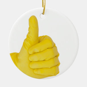 Hand in yellow latex glove ceramic tree decoration