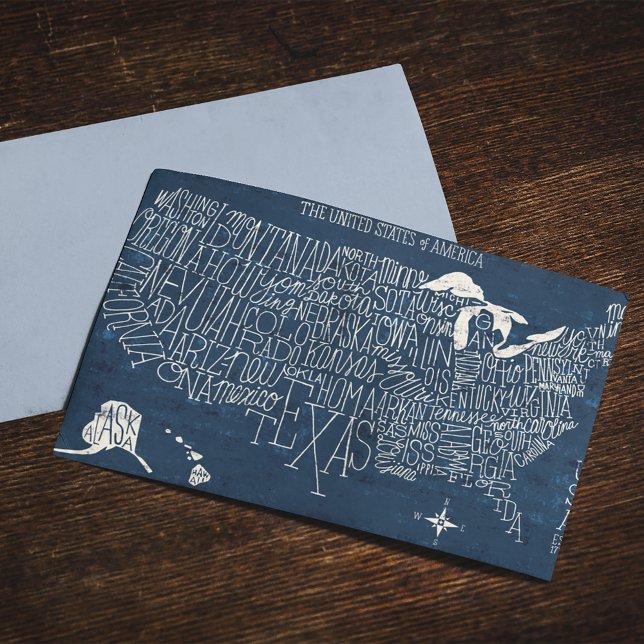 Hand Lettered Blue USA Map Postcard (Postcard on table)