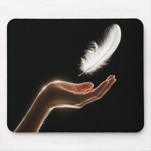 Hand Releasing a White Feather Mouse Pad (Front)