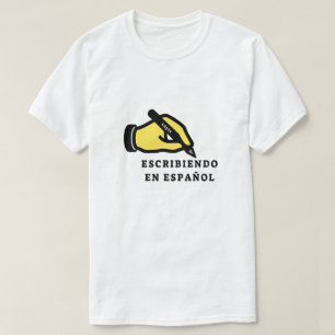 Hand with pencil and text: escribiendo en español T-Shirt