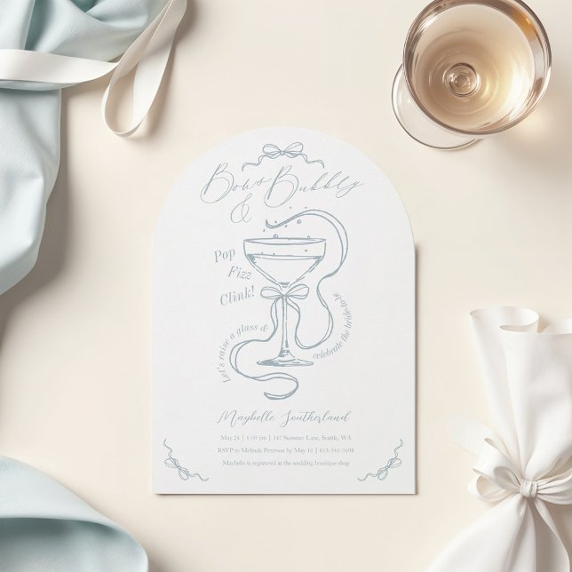 Handdrawn Bows Bubbly Cocktail Bridal Shower Arch Invitation (flatlay of an elegnat classy light pale cream beige surface with a blank white 5x7 invitation, shinn)