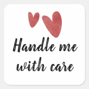 Handle me with care sticker with red heart