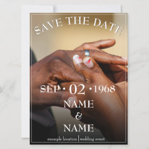 Hands of a coloured wedding couple pin on ring