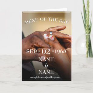Hands of a coloured wedding couple pin on ring thank you card