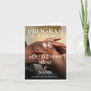 Hands of a wedding couple with a ring card