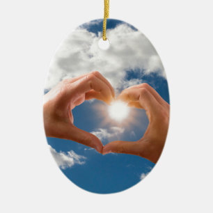 Hands of love ceramic ornament