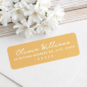 Handwritten script mustard return address label