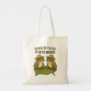 Hang in there it gets worse funny frog tote bag