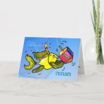 HANUKKAH חנוכה Funny Cute Fish cartoon HEBREW CARD<br><div class="desc">Happy Hanukkah חנוכה is a funny colourful and fun Greeting Card. Sparky yellow cute fish is wearing a candle-like crown and holding a dreidel :) This adorable card is a perfect card for a perfect Hanukkah Greeting. This gorgeous card has a matching range of gifts such as Party Invitations, Greeting...</div>