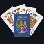 HANUKKAH BLESSINGS  PLAYING CARDS<br><div class="desc">Modern, stylish HANUKKAH BLESSINGS playing cards, designed with large menorah (hanukkiyah) at the centre, and blue dreidel and colourful Star of David on either side. Text reads HANUKKAH BLESSINGS with a placeholder name at the bottom. Both of these are CUSTOMIZABLE so you can personalise with your own greeting or heading,...</div>