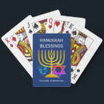 HANUKKAH BLESSINGS  PLAYING CARDS<br><div class="desc">Modern, stylish HANUKKAH BLESSINGS playing cards, designed with large menorah (hanukkiyah) at the centre, and blue dreidel and colourful Star of David on either side. Text reads HANUKKAH BLESSINGS with a placeholder name at the bottom. Both of these are CUSTOMIZABLE so you can personalise with your own greeting or heading,...</div>