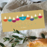 Hanukkah Card | Colourful Oil Lamp Menorah | Gold<br><div class="desc">Celebrate Hanukkah with a vibrant and contemporary greeting card design. This menorah is formed from colourful bowl-shaped oil lamps, each with a glowing flame, arranged in a cheerful display. The centre lamp highlights a faux-foil Star of David, adding both meaning and elegance. Perfect for families who enjoy modern and artistic...</div>