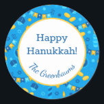 Hanukkah Dreidels Gift Tag<br><div class="desc">These fabulous gift tags would look great on all your Hanukkah gifts.  They are so festive with their menorahs,  gelt,  Hanukkah candles and banners and Stars of David in blue and yellow.  Trendy yet traditional.  And,  they are customisable with your family name.</div>