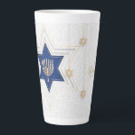 Hanukkah Latte Mug<br><div class="desc">Hanukkah Latte Mug The eight-day Jewish celebration known as Hanukkah or Chanukah commemorates the rededication during the second century B.C. of the Second Temple in Jerusalem, where according to legend Jews had risen up against their Greek-Syrian oppressors in the Maccabean Revolt. Hanukkah, which means “dedication” in Hebrew, begins on the...</div>