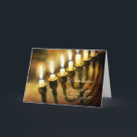 Hanukkah Menorah Lights Shalom, Peace to You Holiday Card<br><div class="desc">This Hanukkah card seems to glow with inner light as the candles on the menorah illuminate an antique book in the background. It elegantly wishes the recipient peace, "Shalom". Chanukah / Hanukkah is the perfect time of year to express your wish for peace to all your friends and loved ones,...</div>