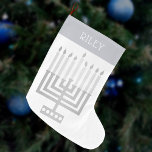 Hanukkah Menorah Silver Tone Elegant Modern Large Christmas Stocking<br><div class="desc">Personalise this elegant and modern style Hanukkah Menorah stocking by adding a name in white to the silver tone "cuff" design. The design is sleek and simple with my original square style Menorah in faux silver on white and a simple yet interesting font for the name. Whether you celebrate Chanuka...</div>
