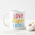 Hanukkah Party Love Light Latkes Personalized Coffee Mug<br><div class="desc">Our Hanukkah Party Love Light Latkes Personalized Funny Quote Coffee Mug will get everyone into the Holiday spirit! Dress up your morning coffee for the holidays. A personalized mug makes a great holiday gift for special family, friends & clients. The colorful, humorous saying stands out on the black starry night...</div>