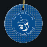 HANUKKAH SAMEACH | Dreidel | Chanukah Ceramic Ornament<br><div class="desc">Stylish HANUKKAH SAMEACH Ornament with faux silver Star of David in a tiled pattern and a large white dreidel at the centre. The background colour is Tekhelet Blue. The text reads HANUKKAH SAMEACH at the top and A GREAT MIRACLE HAPPENED at the bottom. Both are CUSTOMIZABLE if you wish to...</div>