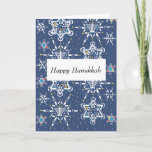 Hanukkah Starflakes Greeting Card<br><div class="desc">This design shows a pattern made from snowflakes in the shape of Stars of David. The larger ones include Hanukkah motifs like dreidels, Hanukkah lamps, and candles. The snowflake designs integrate Hanukkah motifs into six-pointed snowflake shapes, set against a nighttime sky with smaller snowflakes and falling snow. The pattern represents...</div>