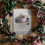 Happiest Howlidays | Dog Photo Christmas Navy Blue Holiday Card<br><div class="desc">Simple, stylish custom photo Happiest Howlidays flat holiday greeting card with modern minimalist handwritten script typography in white and a simple gradient over a full photo with a navy blue colour on the reverse. The photo of your beloved pet and text can easily be personalised for a design as unique...</div>