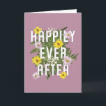 Happily Ever After Pink and Yellow Floral Wedding Card<br><div class="desc">Say congratulations to the happy couple with this pretty wedding congratulations card. It features the vibrant message Happily Ever After on the front against a dusty rose background accented with pretty yellow and pink daisies. The inside message is ready for you to customise with your own personalised greeting.</div>
