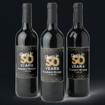Happy 50th Birthday Wine Label<br><div class="desc">Personalised 50th birthday party wine bottle labels featuring a stylish black background that can be changed to any colour,  glamourous gold sparkly glitter,  fifty gold hellium balloons,  and a simple text template that is easy to personalise.</div>