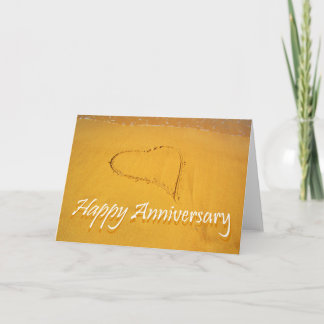 Happy Anniversary, Love heart drawn in the sand. Card