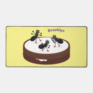 Happy ants ice skating on cookie cartoon desk mat