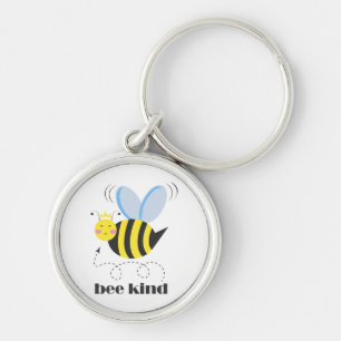 Happy bee princess with crown and slogan Bee Kind Key Ring