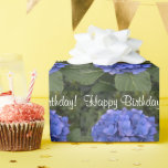 Happy Birthday Blue Hydrangea Flowers Wrapping Paper<br><div class="desc">Happy birthday is written in white script.  Pretty blue hydrangea flowers and big green leaves.  Original Photography © TamiraZDesigns.</div>