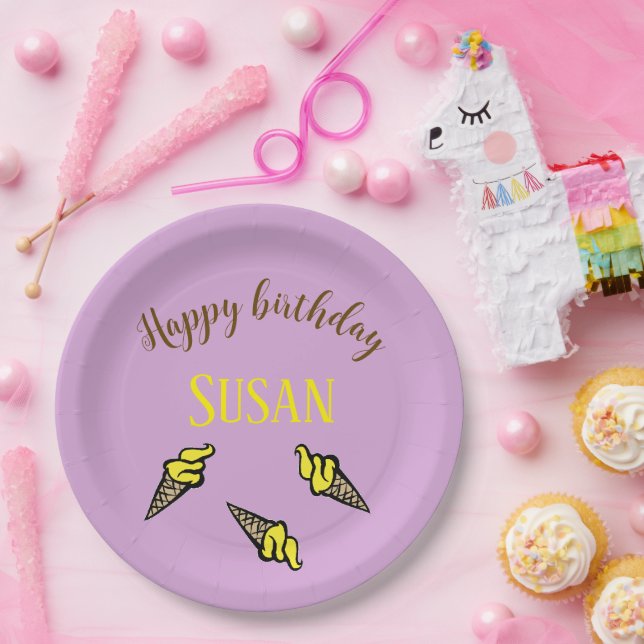 Happy birthday yellow ice cream on purple paper plate (Party)
