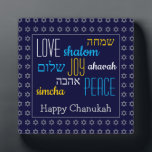 HAPPY CHANUKAH Love Joy Peace HEBREW Personalised Plaque<br><div class="desc">This is a colourful festive desktop plaque with faux silver Star of David in a subtle pattern against a deep blue background. The words LOVE JOY PEACE including their Hebrew translations are colour-coded. The text is customisable in case you wish to change anything. HAPPY CHANUKAH is written in faux silver...</div>