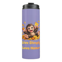 Happy Cute Monkey Playing in Falling Autumn Leaves