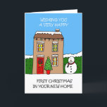 Happy First Christmas in Your New Home Holiday Card<br><div class="desc">A cartoon festive house and garden decorated with fairy lights and a snowman. The image is accompanied by the words 'Wishing you a very happy first Christmas in your new home'.</div>