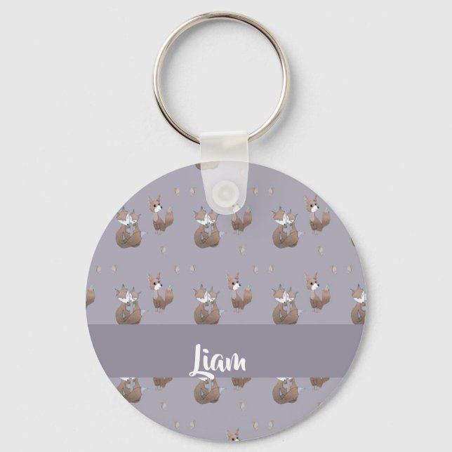 Happy foxes on grey key ring (Front)