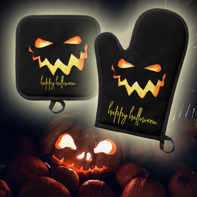 Happy Halloween Glowing Jack-o-lantern Face Oven Mitt & Pot Holder Set (You're going to love this spooky glowing pumpkin face pot holder and oven mitt set.)