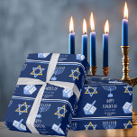 Happy Hanukkah Beautiful Blue Custom Jewish Family Wrapping Paper<br><div class="desc">This cute,  modern Happy Hanukkah wrapping paper features a classy layout of Jewish symbols on a white background with pretty blue typography. This beautiful Chanukah gift wrap features your a menorah,  dreidel,  and Star of David surrounding your message and family name.</div>