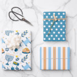 Happy Hanukkah Menorah Wrapping Paper Set of 3<br><div class="desc">A pretty Hanukkah pattern with menorah,  dreidel,  gifts,  vines and flowers. Matching stripes and polka dots complete the festive set.</div>