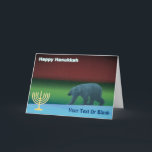 Happy Hanukkah - Polar Lights Polar Bear Holiday Card<br><div class="desc">Chanukkah greetings from the Frozen Chosen. A polar bear roams the ice during the long polar night; the Northern Lights in red and green glow in the distance. A Chanukkah menorah appears along with text reading,  "Happy Hanukkah". Add your own additional text.</div>